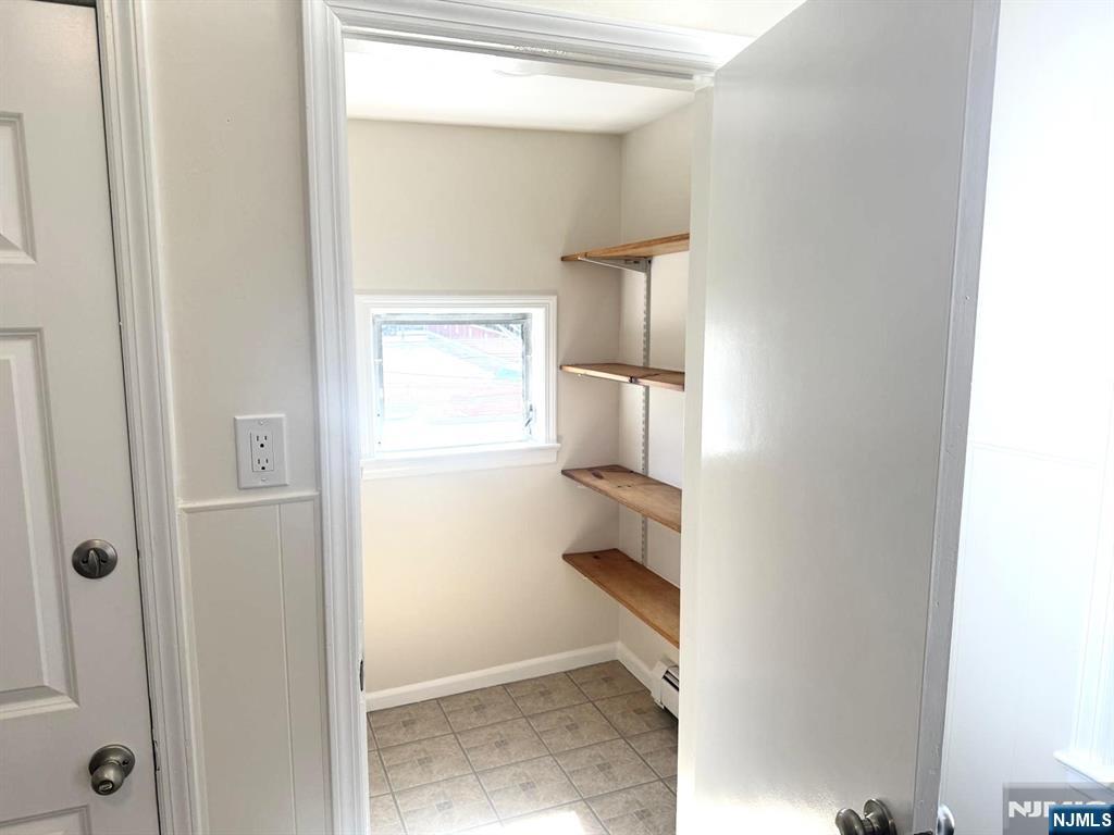 210-212 Maple Street, Unit 2 Kearny, NJ 07032 - Photo 5 of 9 a view of cabinets and closet