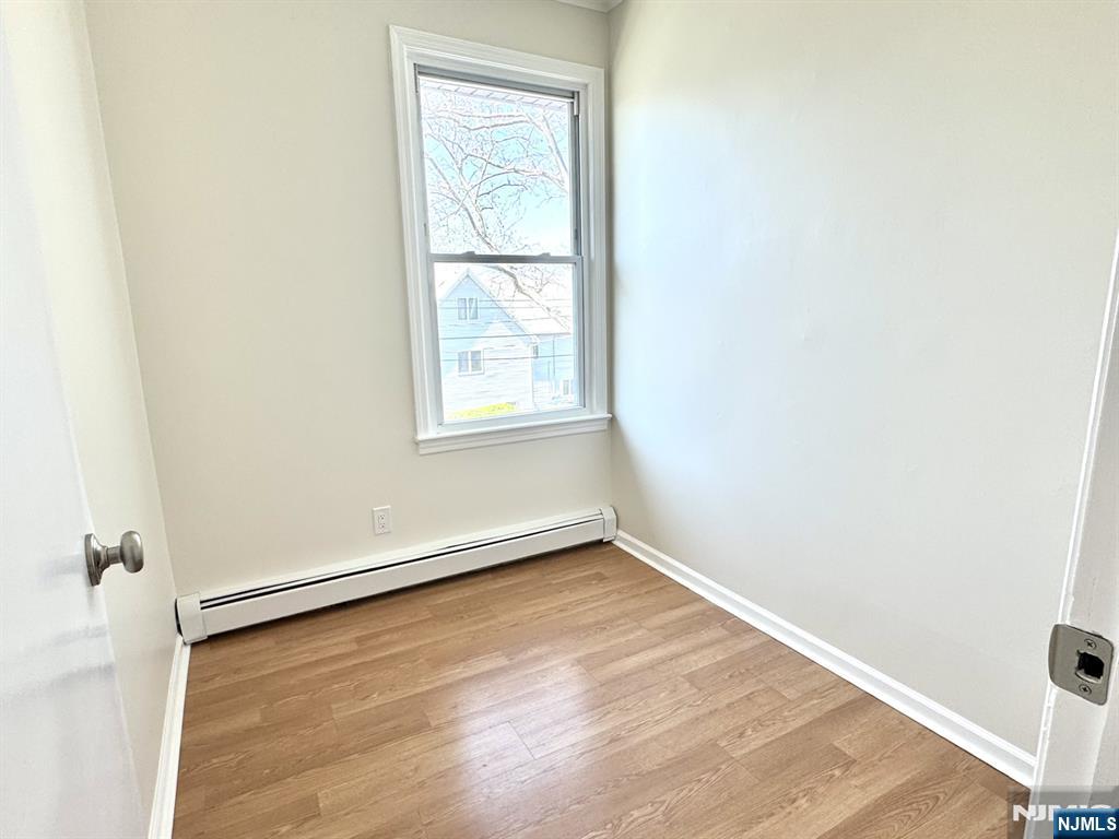 210-212 Maple Street, Unit 2 Kearny, NJ 07032 - Photo 8 of 9 an empty room with a window