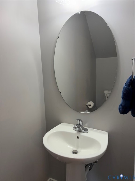 1944 Kennington Park Road Aylett, VA 23009 - Photo 8 of 24 Downstairs Half bath with Pedestal sink with a pol