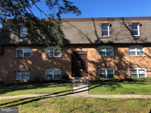 front view of house with a yard