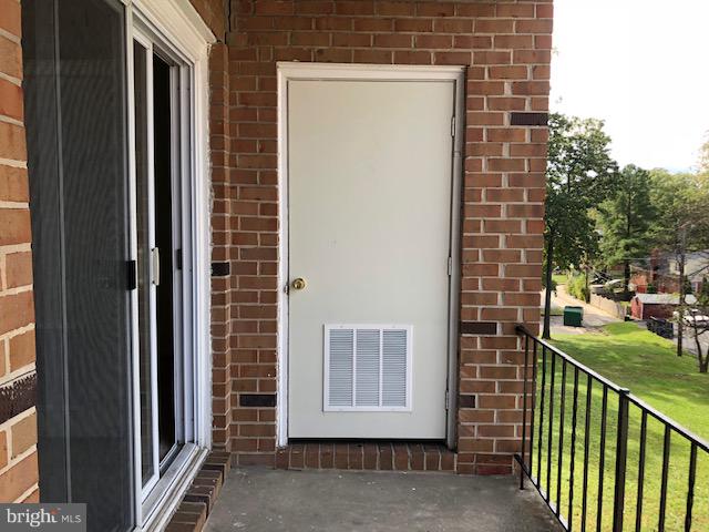 6427 Walther Avenue, Unit E Baltimore, MD 21206 - Photo 15 of 17 a view of a door and a window