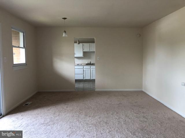 6427 Walther Avenue, Unit E Baltimore, MD 21206 - Photo 3 of 17 an empty room with a empty space