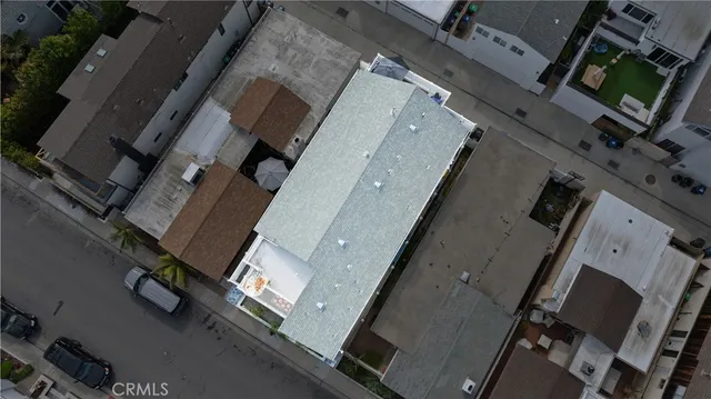 an aerial view of a house with a flat screen tv