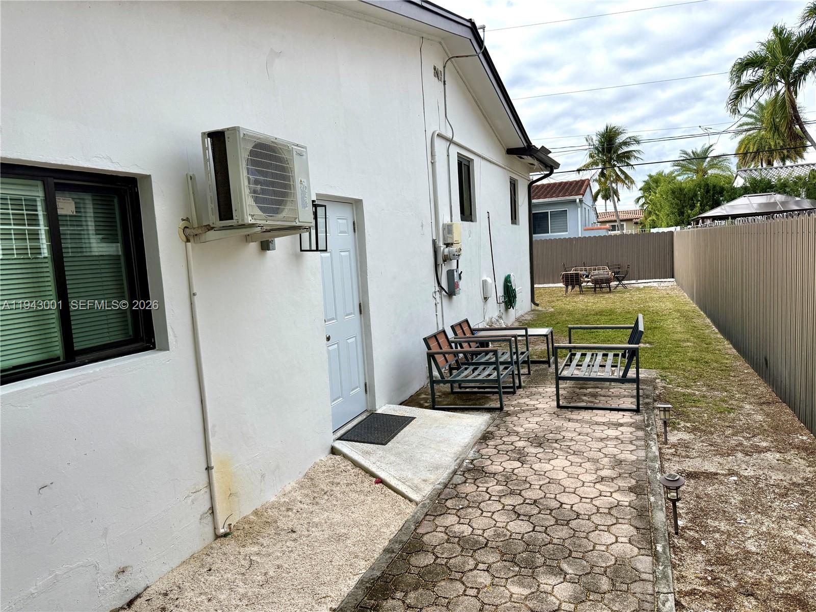 2120 Southwest 83rd Avenue Miami, FL 33155 - Photo 7 of 8 a balcony with chairs and a rug