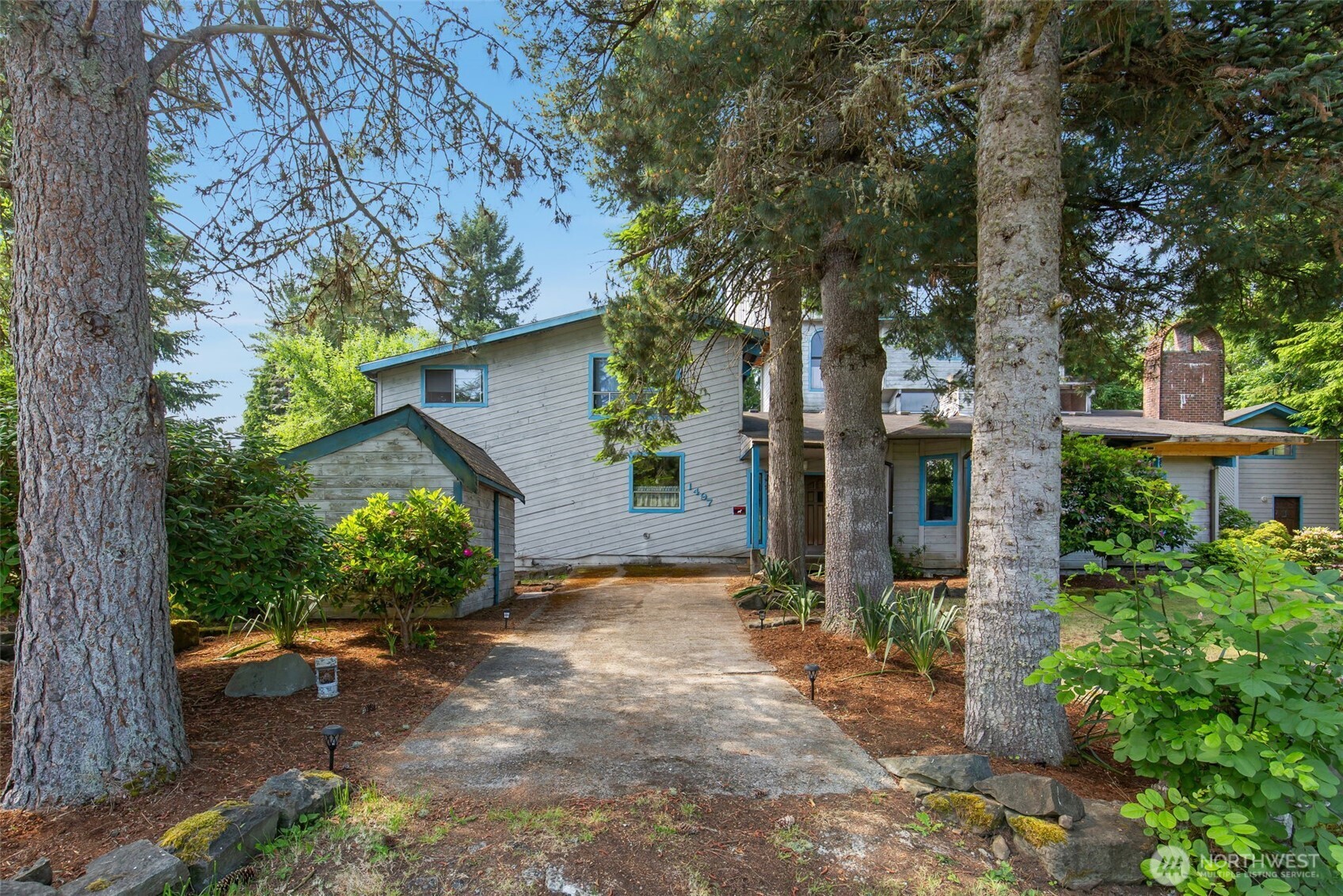 1497 Old Military Road Southeast Tenino, WA 98589 - Photo 2 of 34 a view of a house with a tree