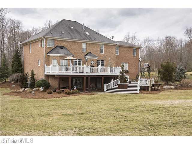 5906 Autumn Gate Drive Oak Ridge, NC 27310 - Photo 2 of 16 Exterior Back.