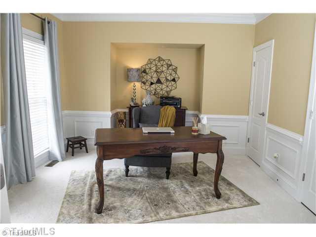 5906 Autumn Gate Drive Oak Ridge, NC 27310 - Photo 5 of 16 Living Room. Has multiple uses-homeowners using room as a office. It also connects to a full bath and has a closet.