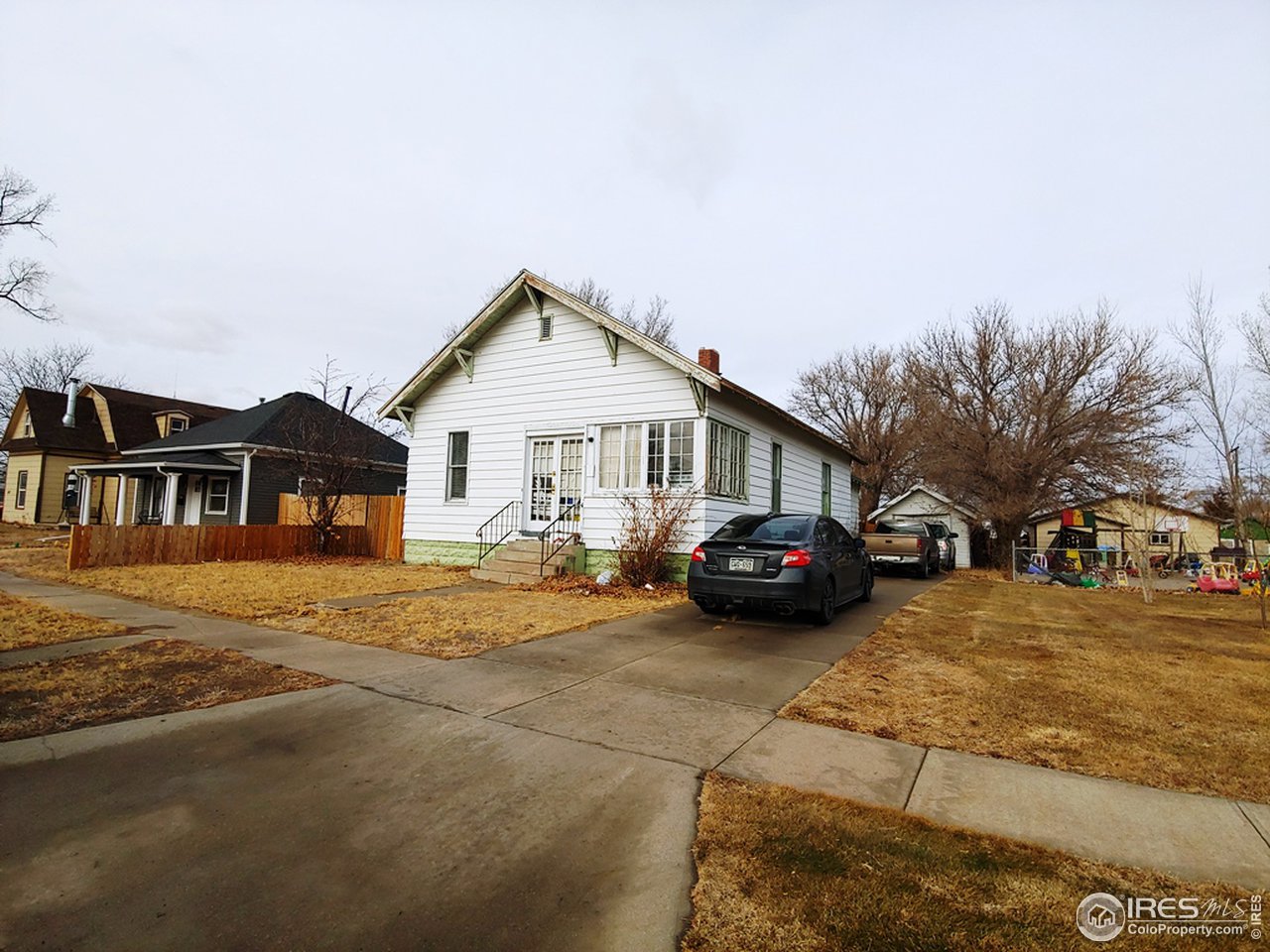 324 Platte Street Sterling, CO 80751 - Photo 1 of 18 a view of a house with a patio