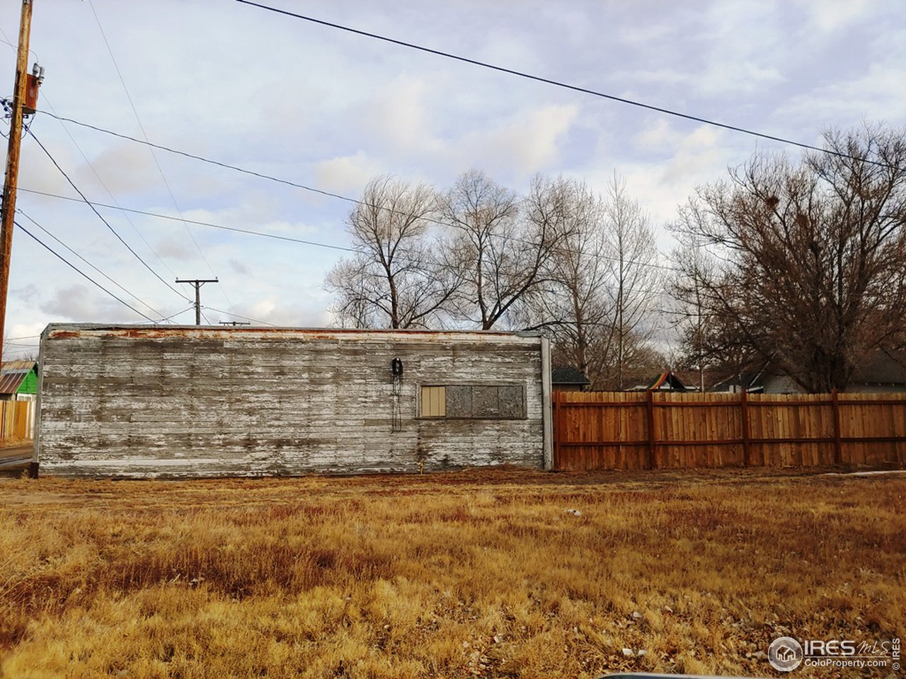 324 Platte Street Sterling, CO 80751 - Photo 17 of 18 a view of a backyard