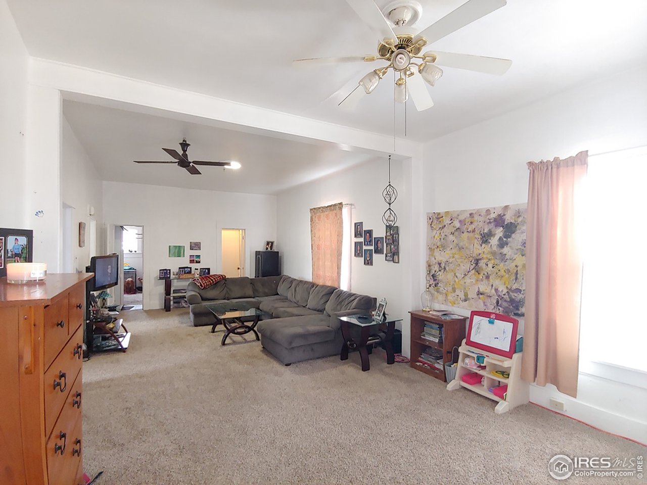 324 Platte Street Sterling, CO 80751 - Photo 6 of 18 a living room with furniture