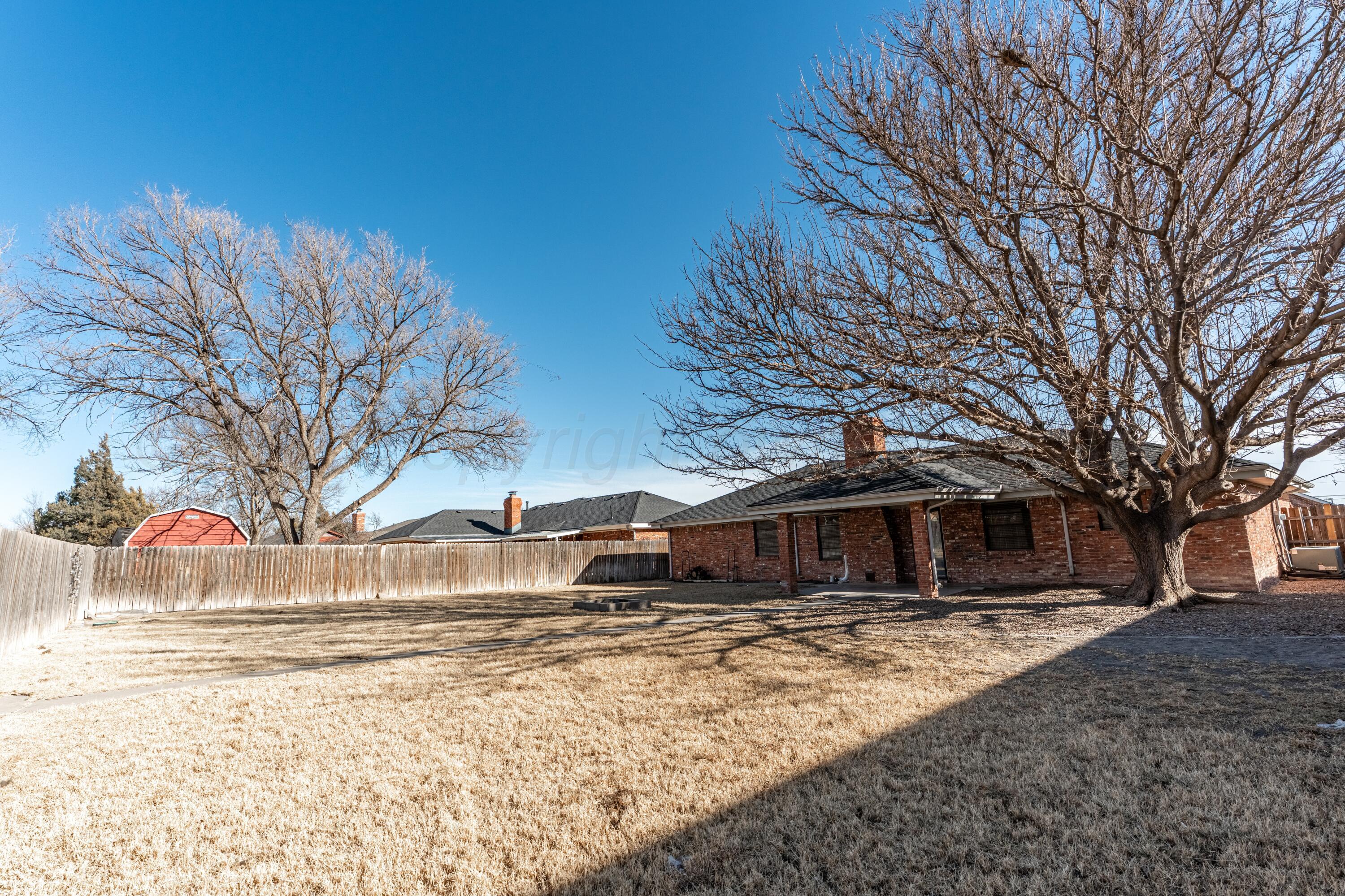 2907 Mable Drive Canyon, TX 79015 - Photo 17 of 19 a front view of a house with a yard covered with snow