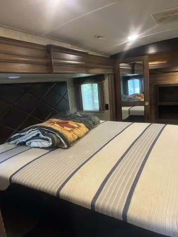 a kitchen with a sink a counter top space appliances and a counter top space