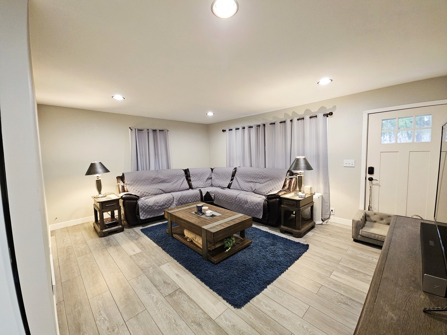 21272 Lyndon Road Morrison, IL 61270 - Photo 8 of 11 a living room with furniture and a wooden floor