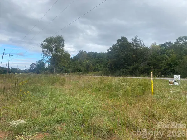 a view of a lake and a yard