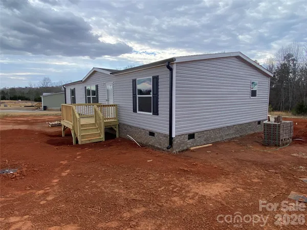 a view of backyard of house