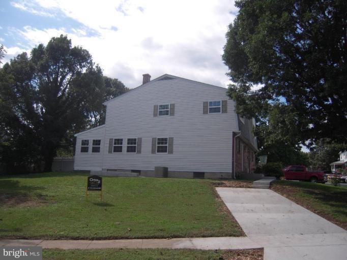 8592 Creek Road Pasadena, MD 21122 - Photo 14 of 17 Side view showing family room addition