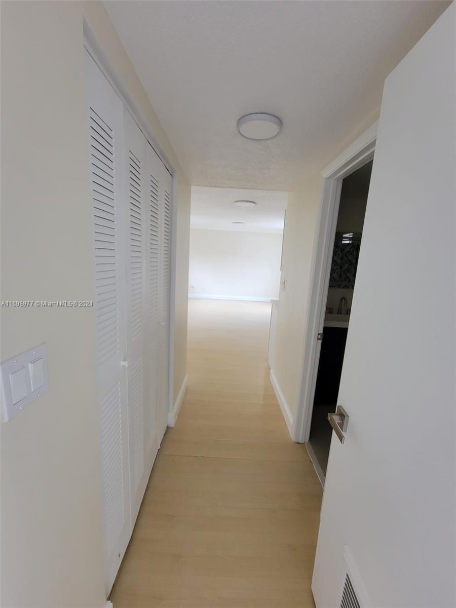 30701 Southwest 150th Avenue, Unit C Homestead, FL 33033 - Photo 11 of 30 a view of hallway with stairs