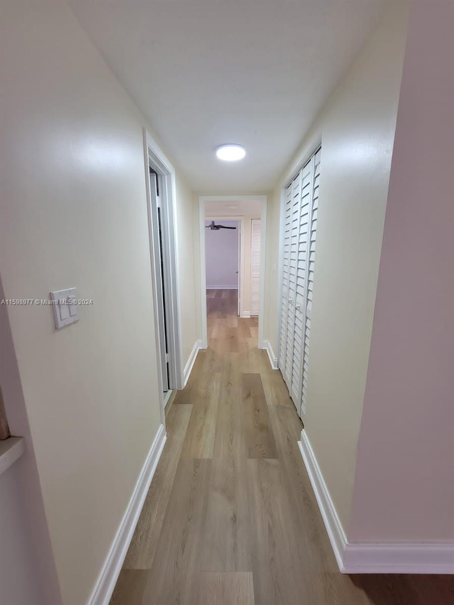 30701 Southwest 150th Avenue, Unit C Homestead, FL 33033 - Photo 12 of 30 a view of hallway with stairs