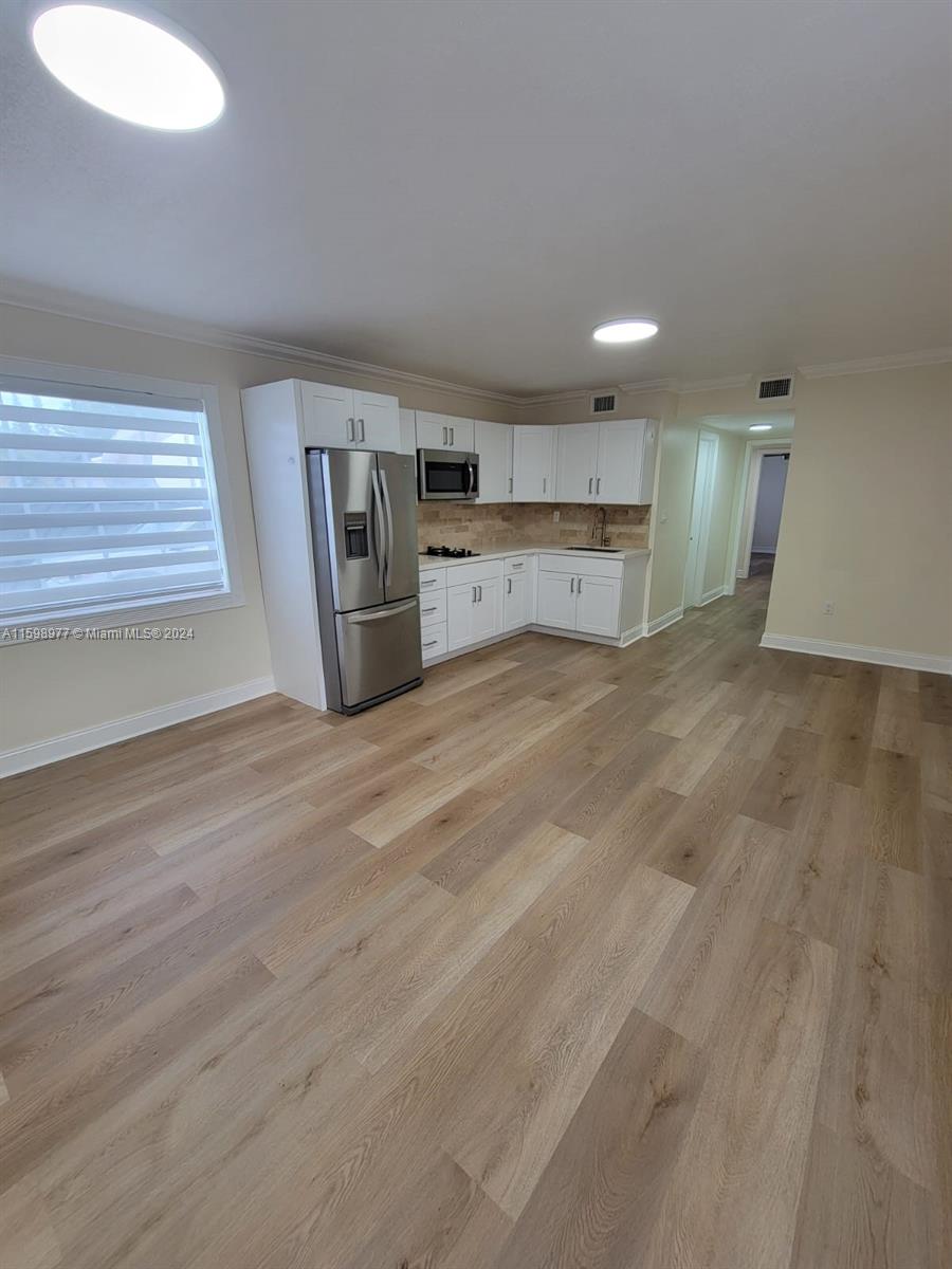 30701 Southwest 150th Avenue, Unit C Homestead, FL 33033 - Photo 15 of 30 a view of a kitchen with a sink and dishwasher