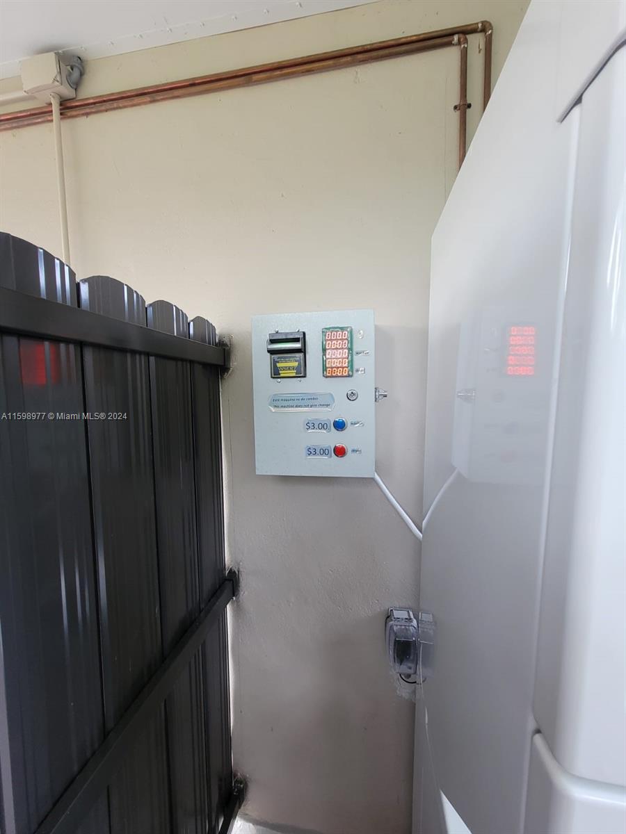 30701 Southwest 150th Avenue, Unit C Homestead, FL 33033 - Photo 30 of 30 a utility room with dryer and washer