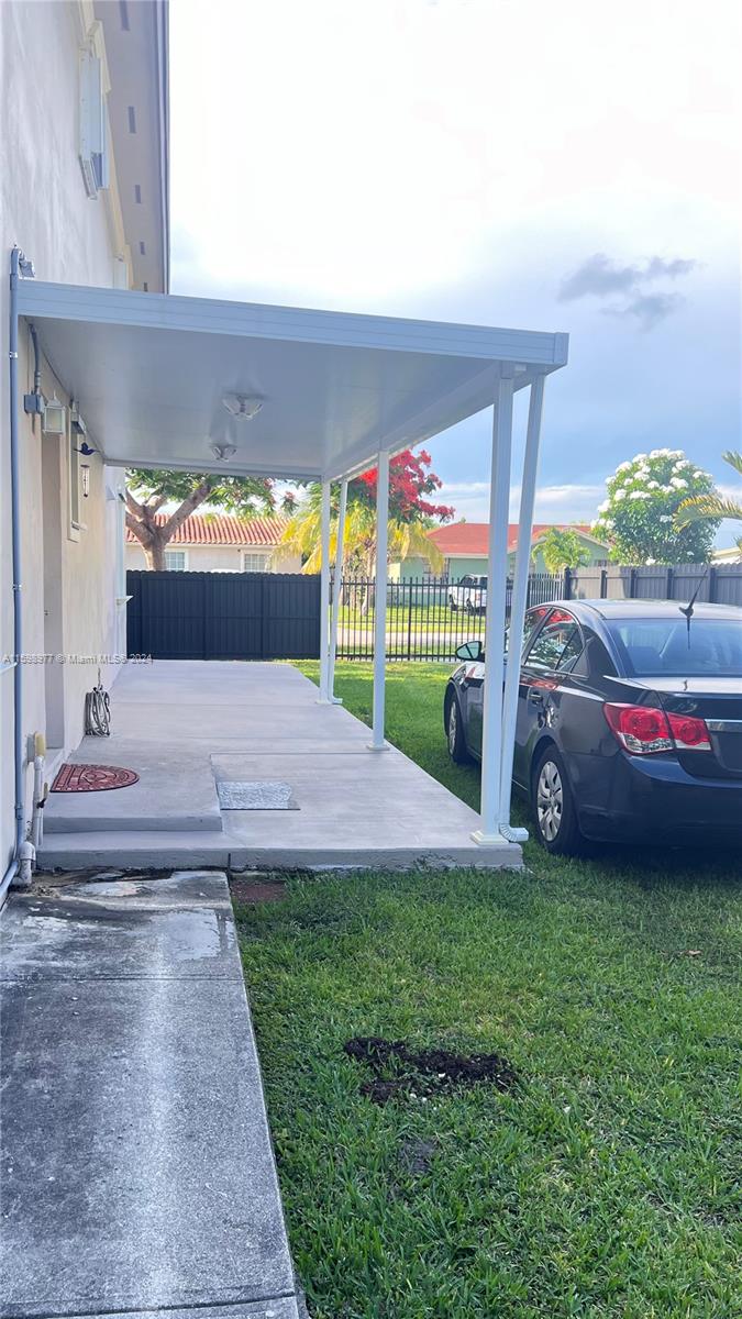 30701 Southwest 150th Avenue, Unit C Homestead, FL 33033 - Photo 4 of 30 a view of yard with patio