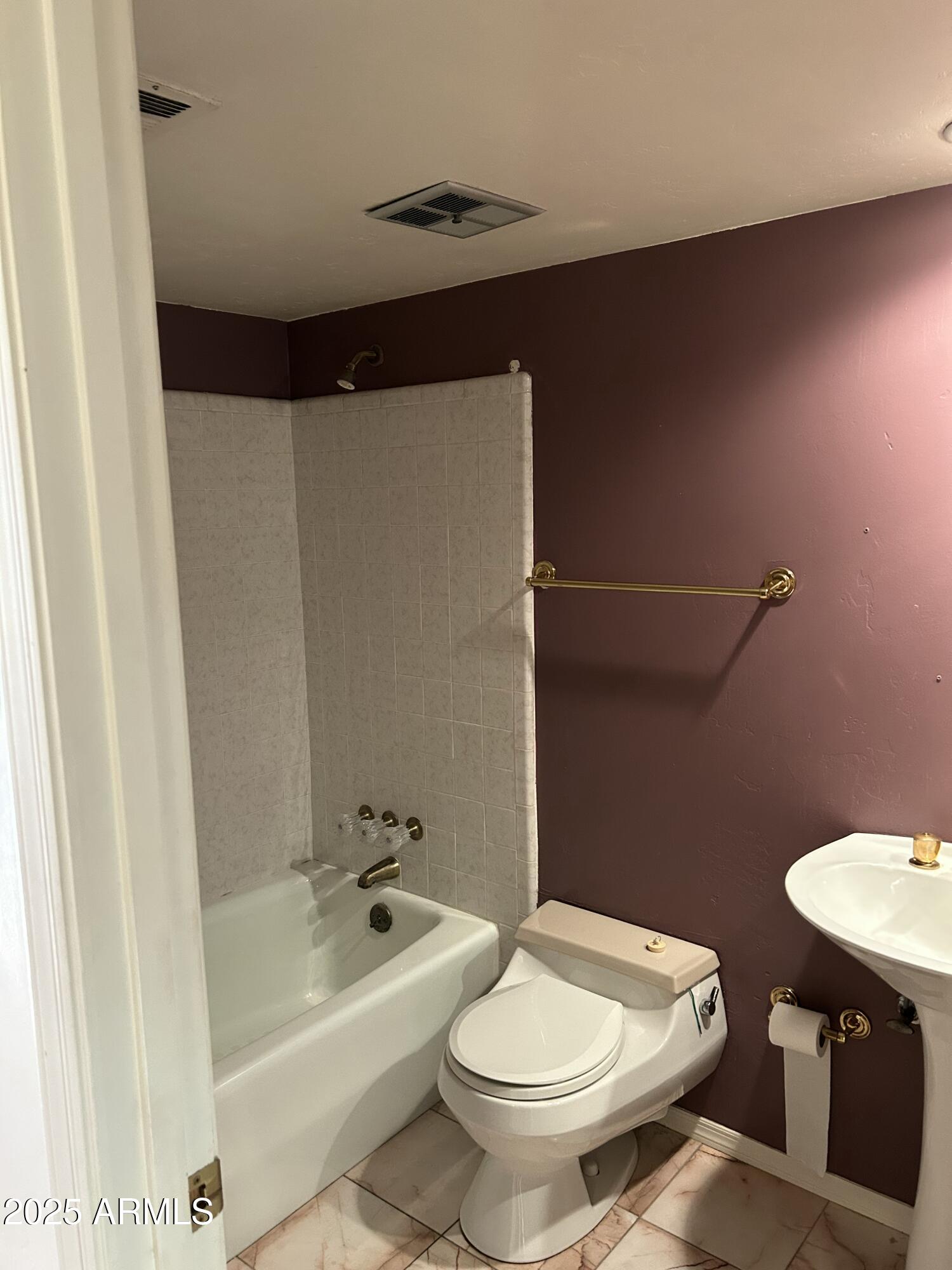 5736 North 25th Street Phoenix, AZ 85016 - Photo 14 of 24 a bathroom with a sink toilet and bathtub