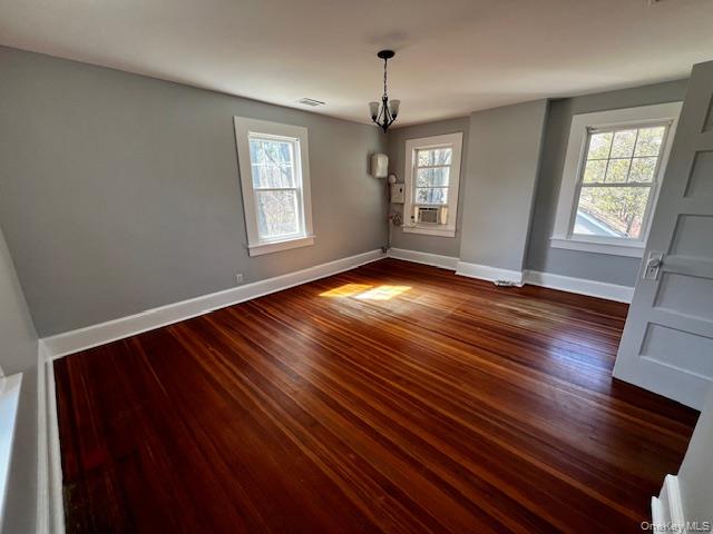 26 Pump House Road Cortlandt Manor, NY 10567 - Photo 11 of 19 an empty room with wooden floor and windows