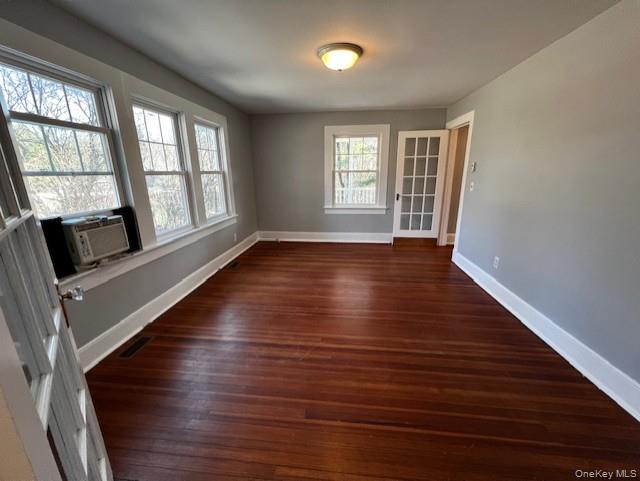 26 Pump House Road Cortlandt Manor, NY 10567 - Photo 5 of 19 an empty room with wooden floor and windows