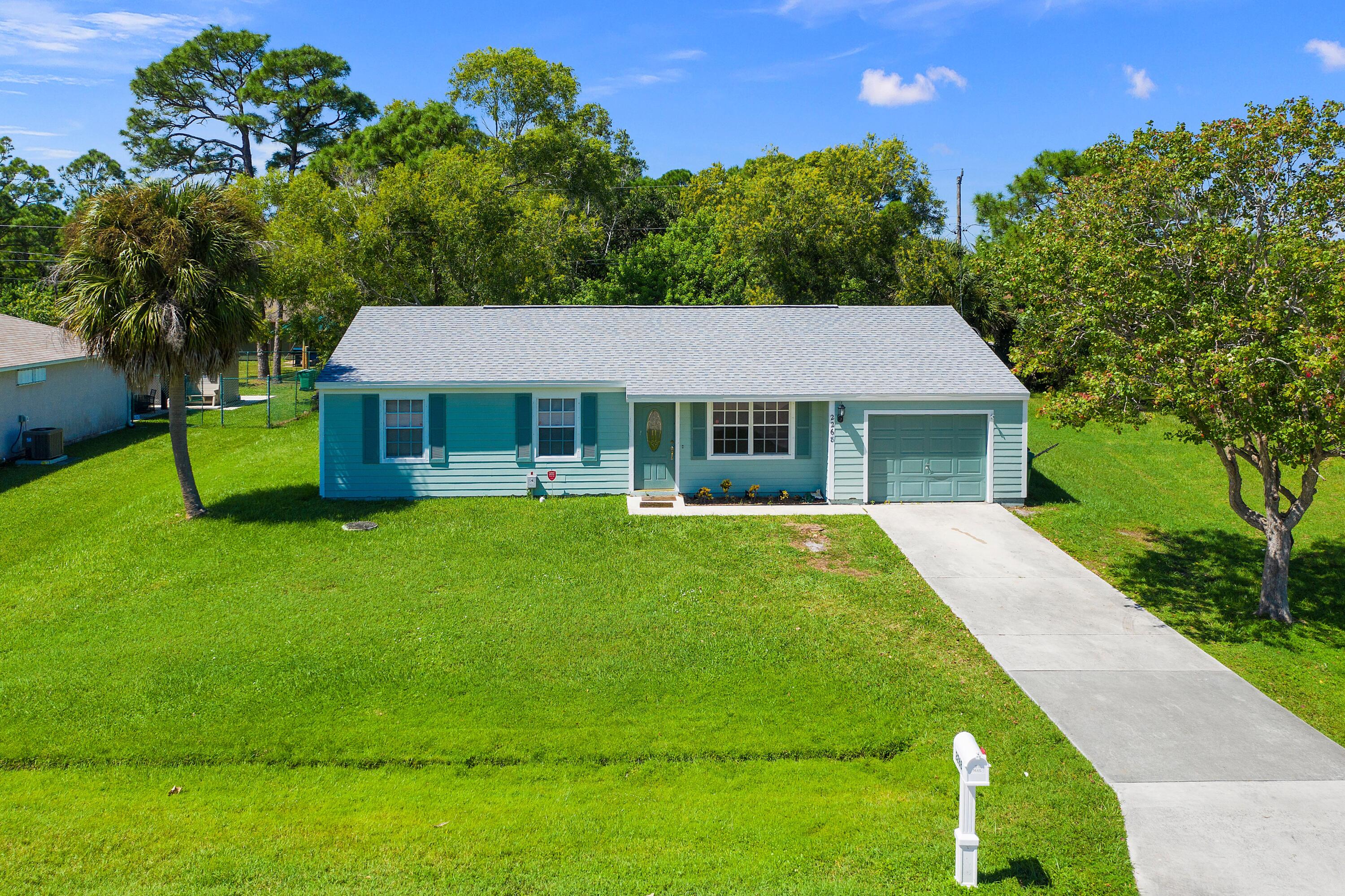 2268 Southeast Merrill Road Port St. Lucie, FL 34952 - Photo 1 of 23 front