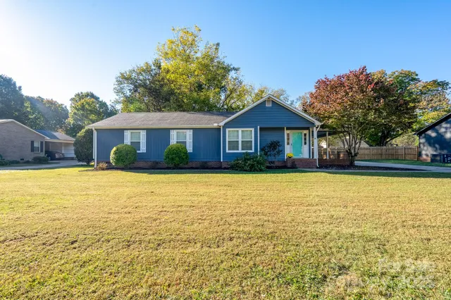 a front view of a house with a swimming pool