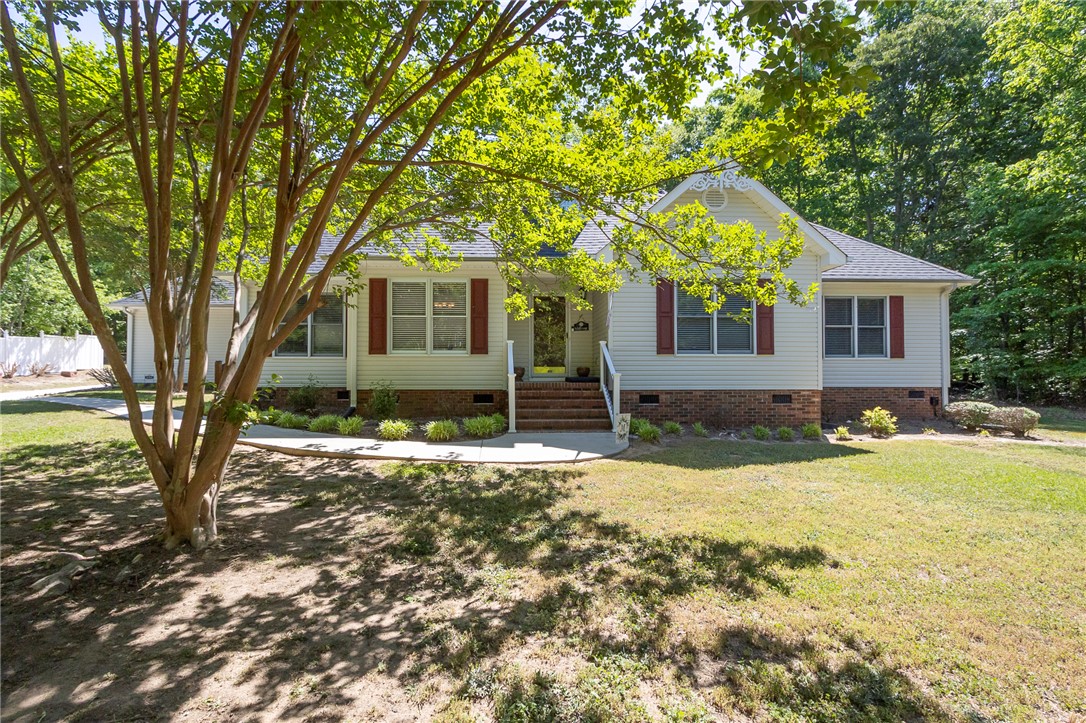 151 Hannah Circle Anderson, SC 29621 - Photo 2 of 46 This charming home offers a welcoming facade with classic details and lush surrounding greenery.