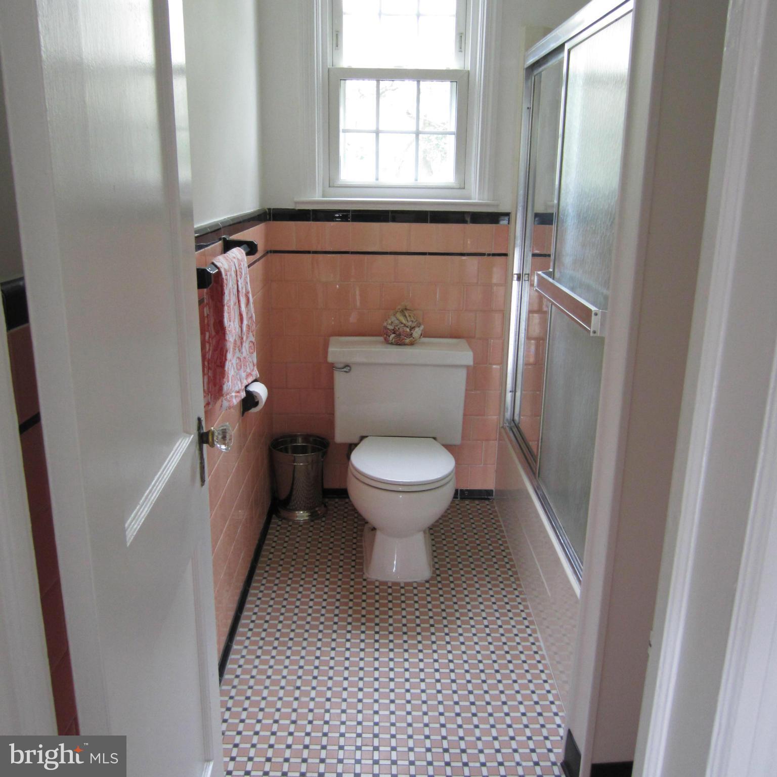10148 Sutherland Road Silver Spring, MD 20901 - Photo 13 of 30 a bathroom with a toilet and a shower