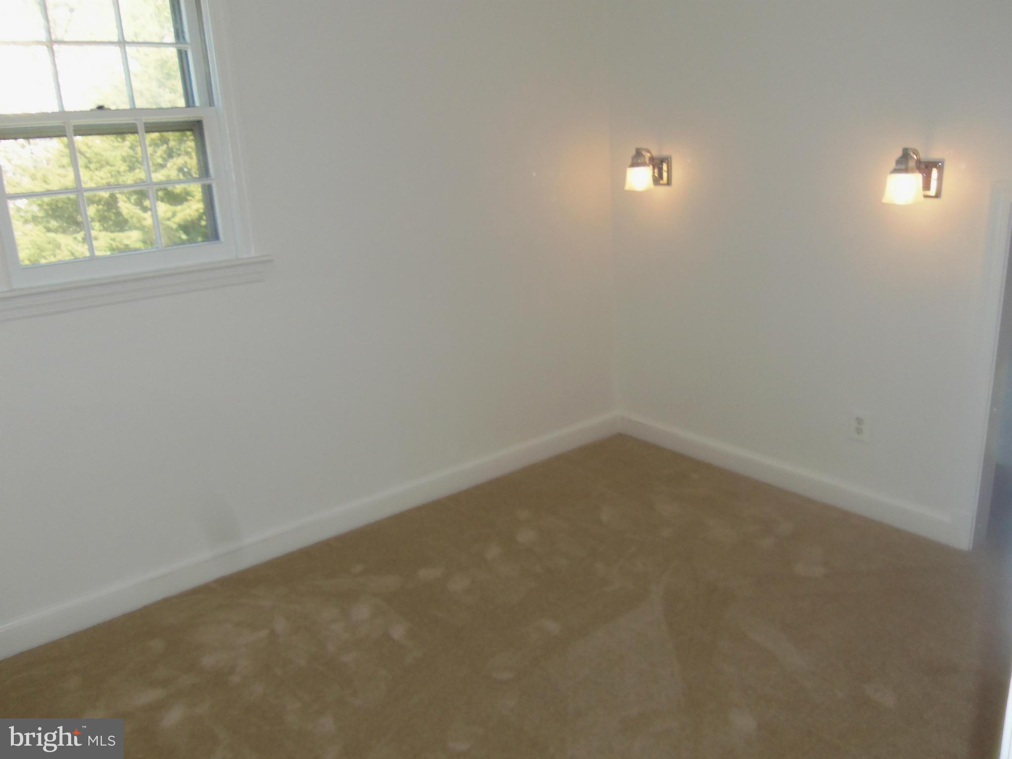 10148 Sutherland Road Silver Spring, MD 20901 - Photo 19 of 30 an empty room with a window