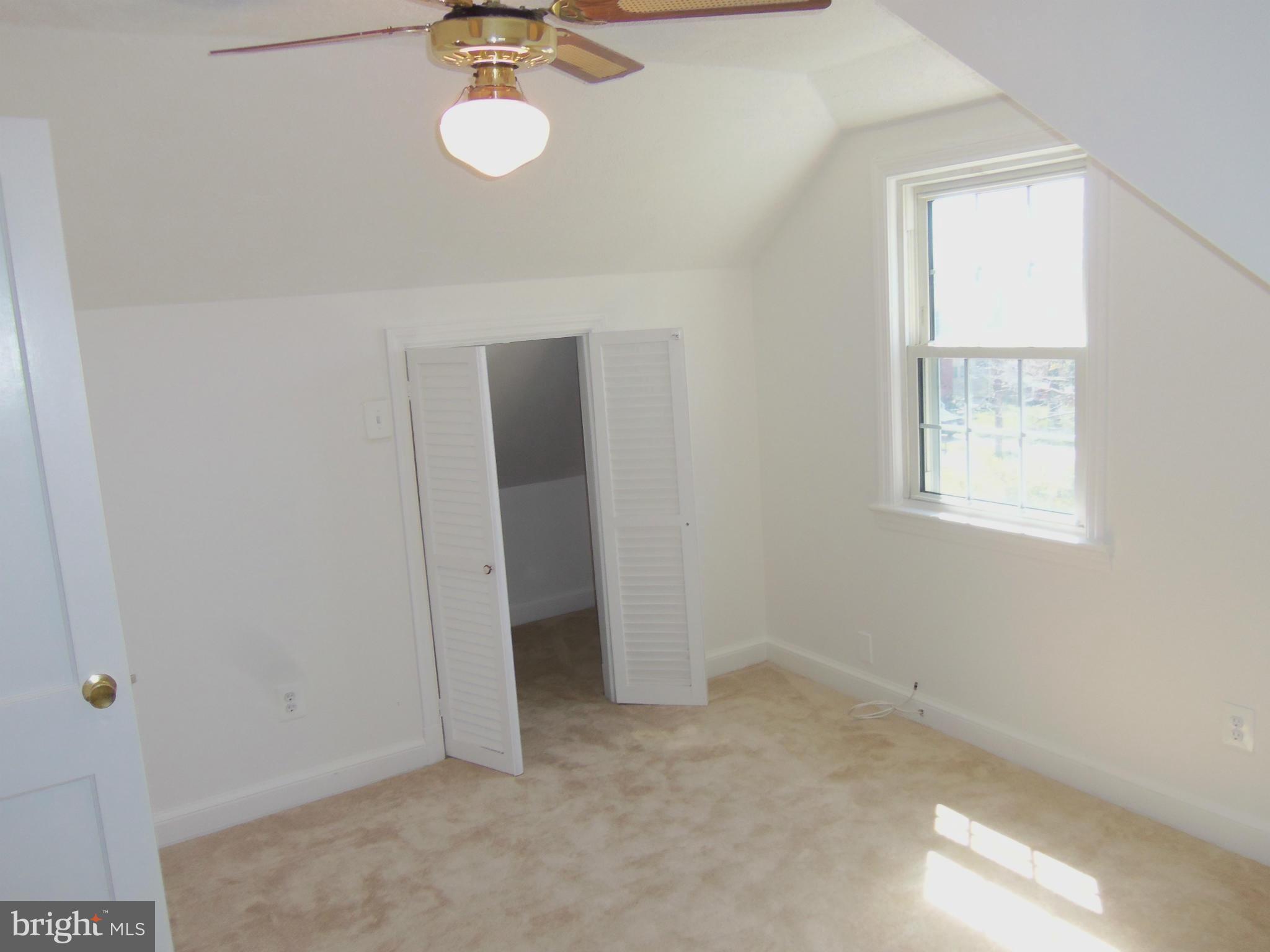 10148 Sutherland Road Silver Spring, MD 20901 - Photo 24 of 30 an empty room with a window