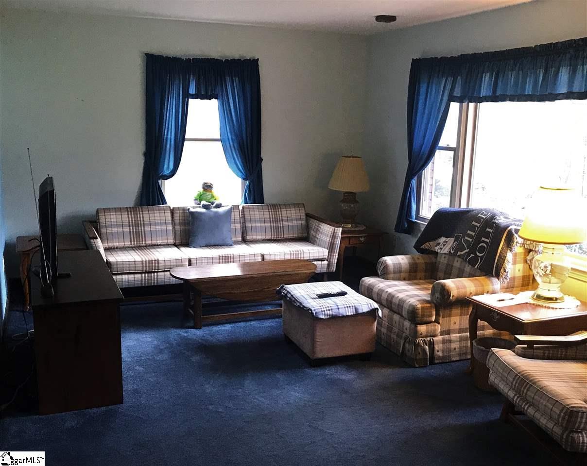 332 Haywood Road Easley, SC 29640 - Photo 2 of 27 Great natural light from large picture window.