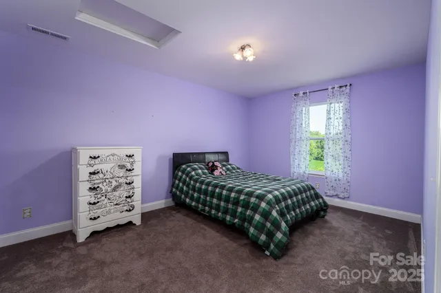 a room with furniture and window