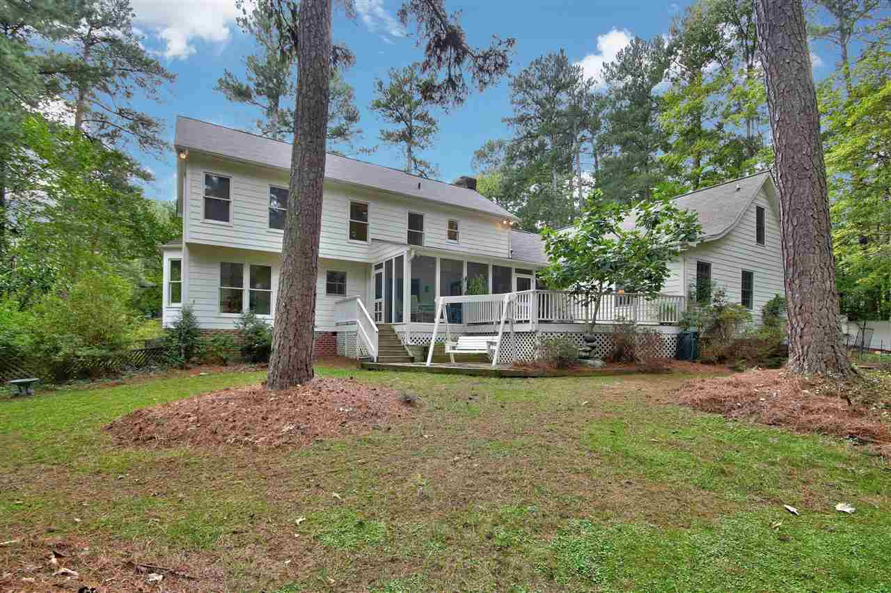 5216 Caber Road Raleigh, NC 27613 - Photo 24 of 25 Sitting on almost an acre (.96), you will have plenty of space for gardening or room to play. Backyard