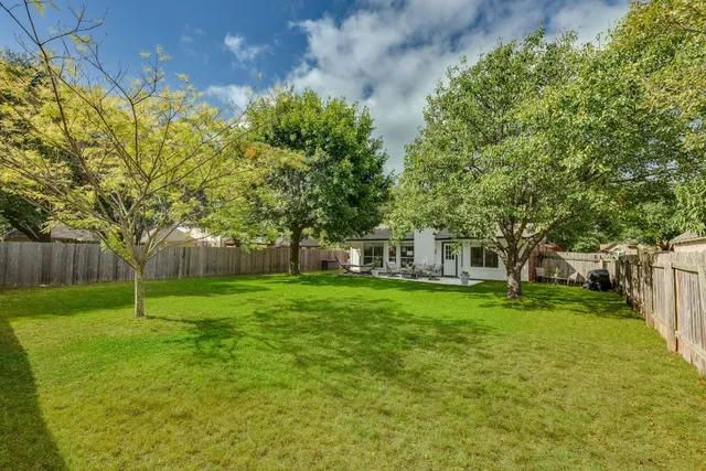 an outdoor space with chairs