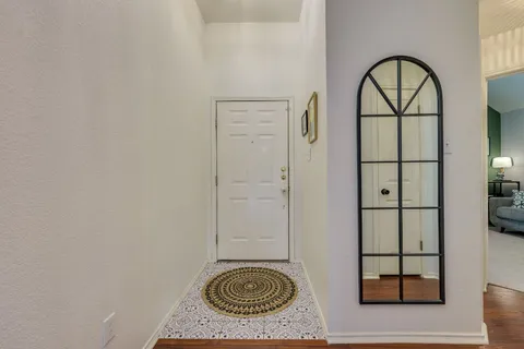 a view of wooden floor in a bathroom