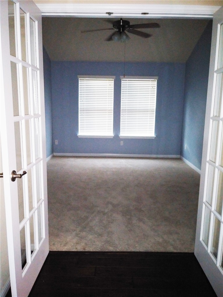348 Stone View Trail Austin, TX 78737 - Photo 15 of 26 Dedicated office with soothing blue paint and ceiling fan