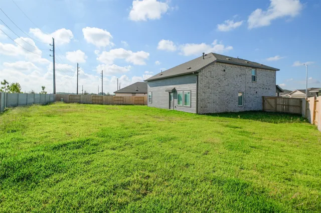 a house view with a garden space