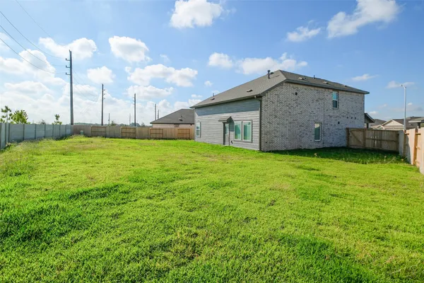 a house view with a garden space