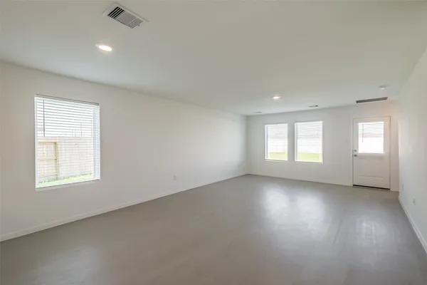 an empty room with windows