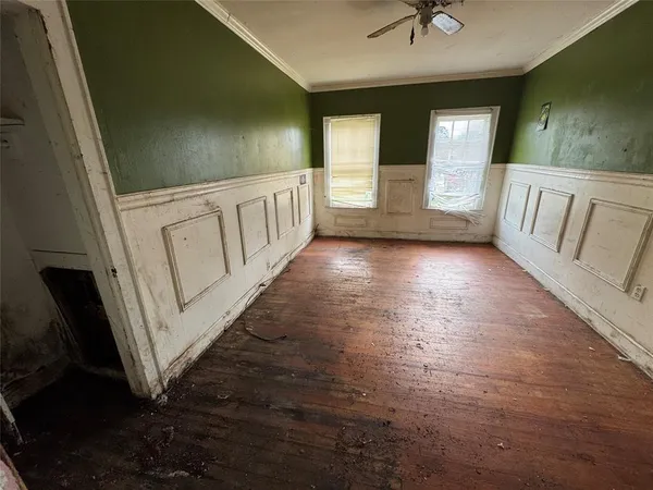 a view of a hallway with stairs