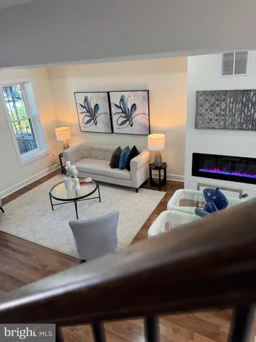 a bathroom with a double vanity sink and mirror