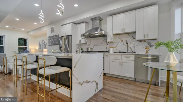 a bedroom with a large bed and a view of bedroom