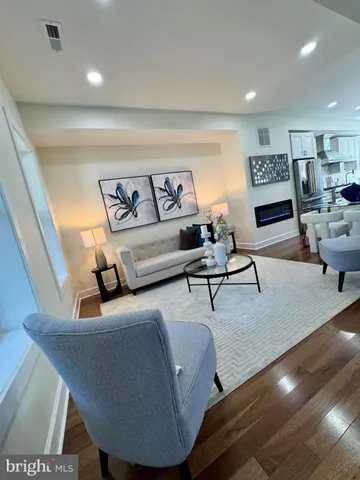 a kitchen with stainless steel appliances granite countertop a stove and a refrigerator
