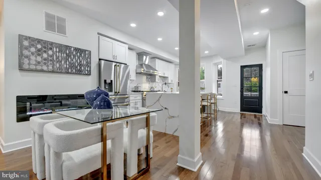 a living room with patio furniture