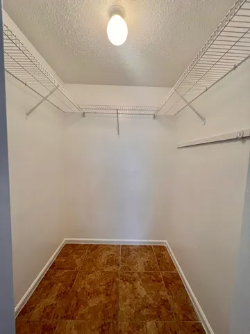 a view of small space with racks on the wall