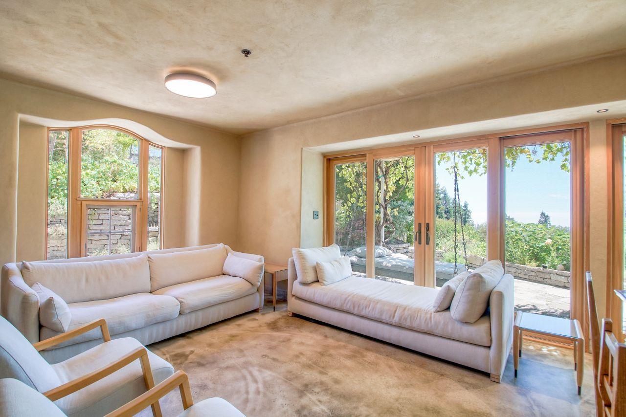 1069 Summit Road Watsonville, CA 95076 - Photo 12 of 50 a living room with furniture and a large window